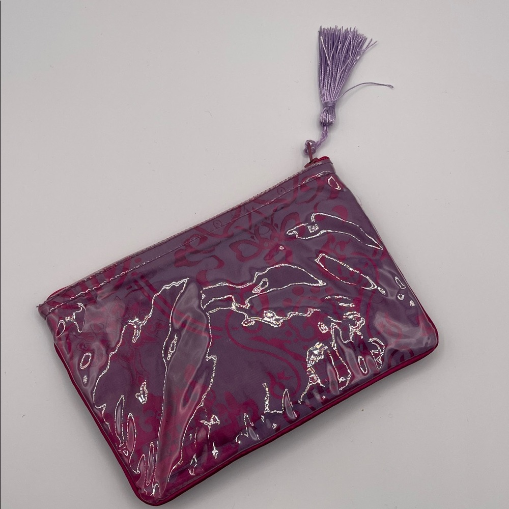 PURPLE FLORAL ZIP POUCH WITH TASSEL PVC OVERLAY